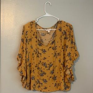 Yellow Lauren Conrad shirt with a floral pattern